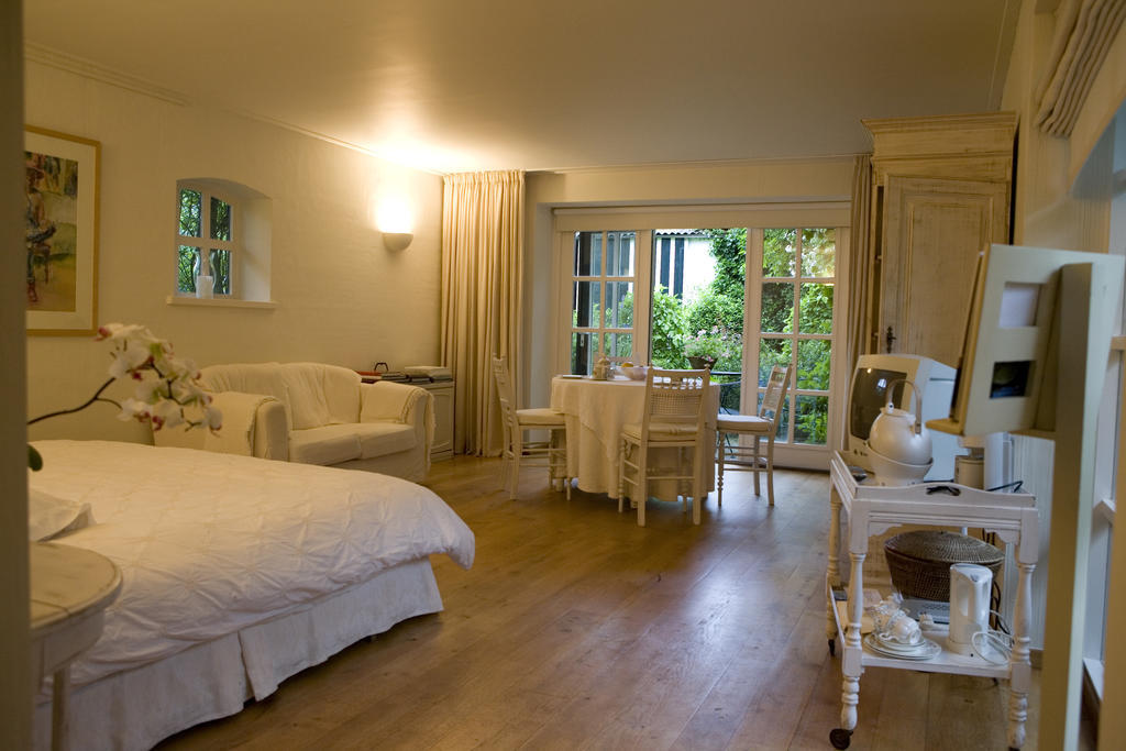 Guesthouse Veerhoeve Слойс Стая снимка